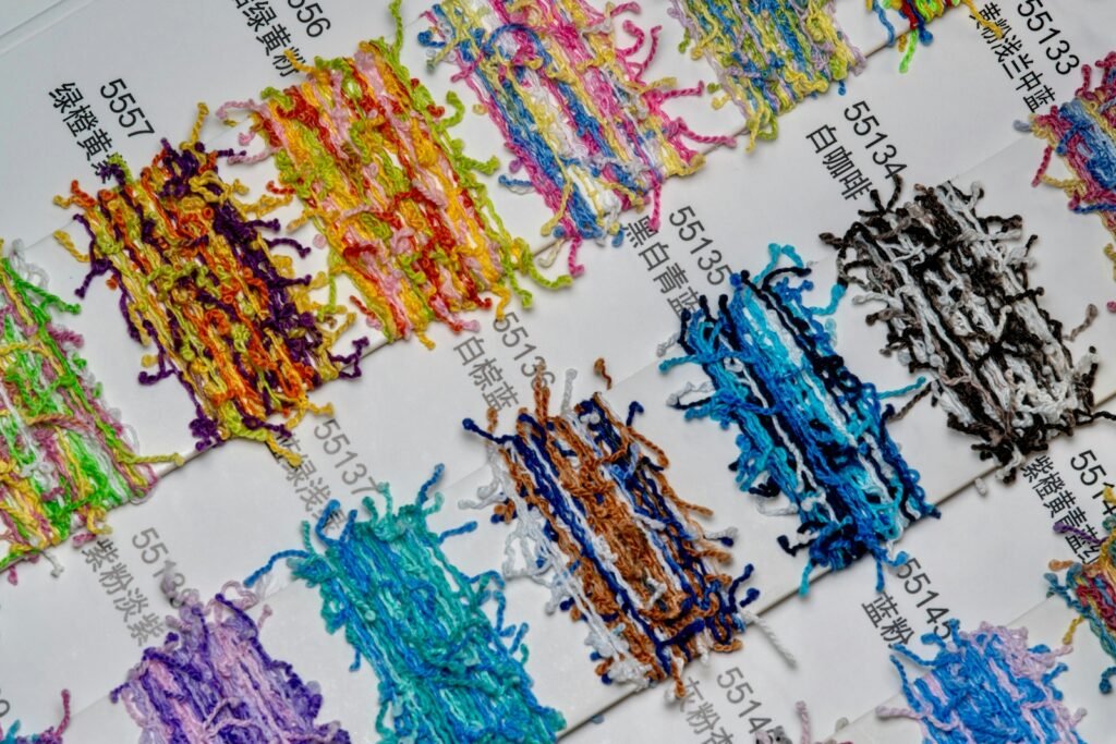 Colorful embroidery threads arranged by color code